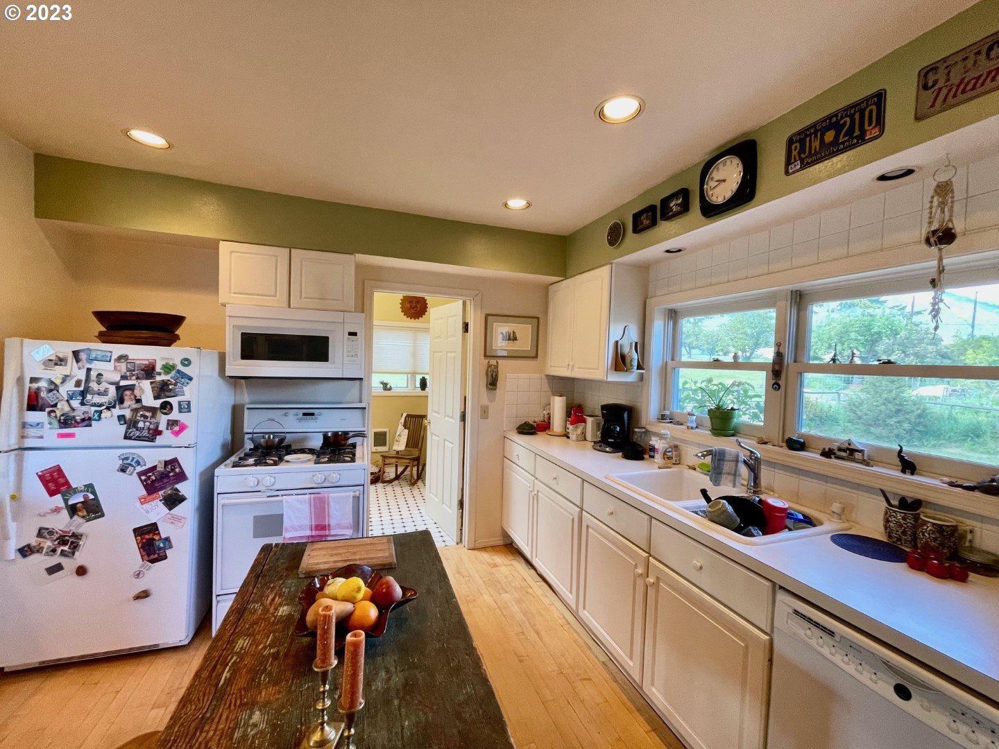 809 South Lake Street Joseph, OR 97846 - Photo 12 of 38 a kitchen with stainless steel appliances a sink a stove a refrigerator and cabinets