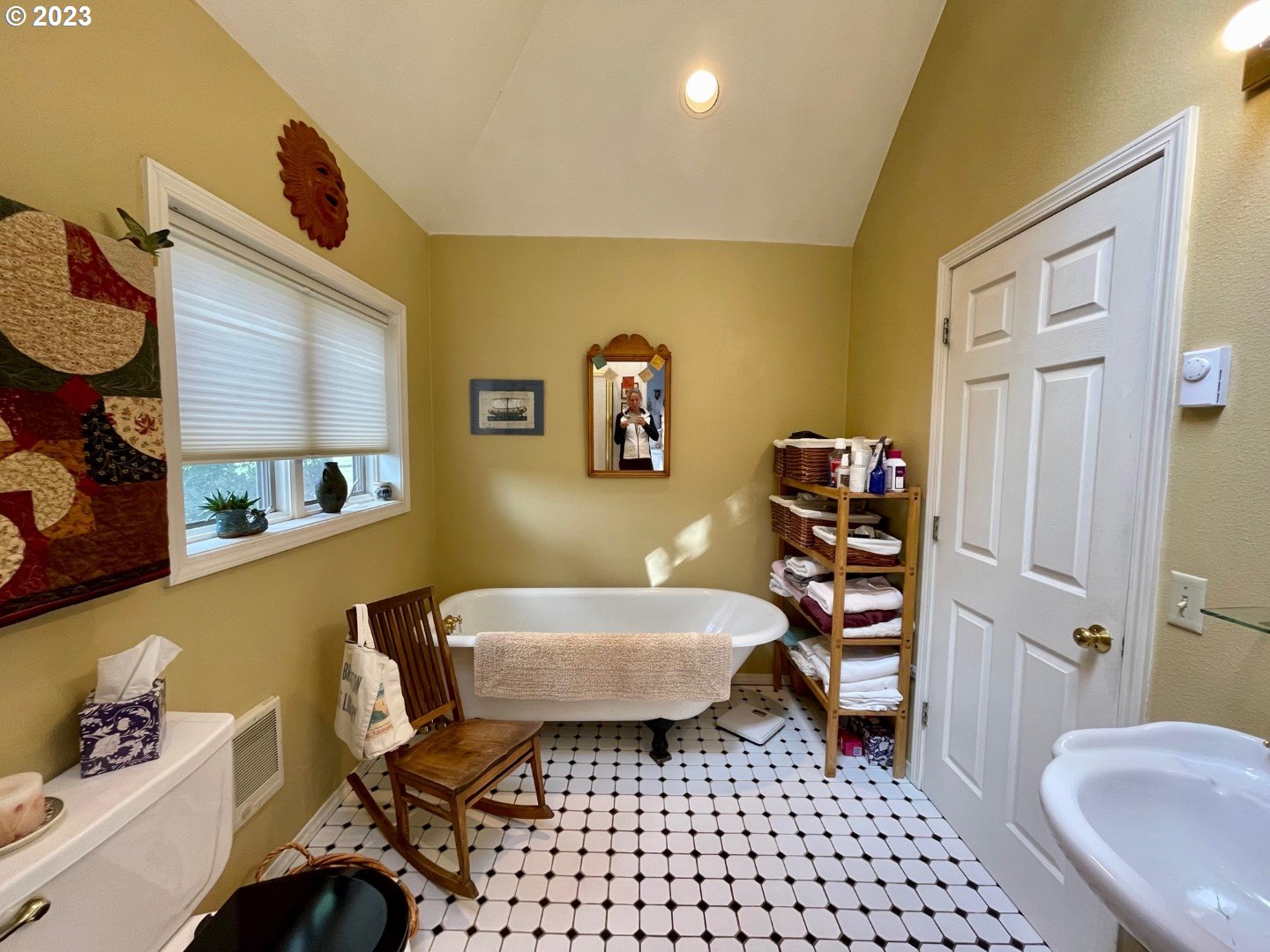 809 South Lake Street Joseph, OR 97846 - Photo 17 of 38 a bedroom with a bed and furniture