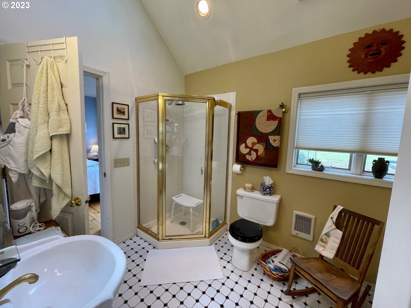 809 South Lake Street Joseph, OR 97846 - Photo 18 of 38 a bathroom with a granite countertop sink a mirror and shower