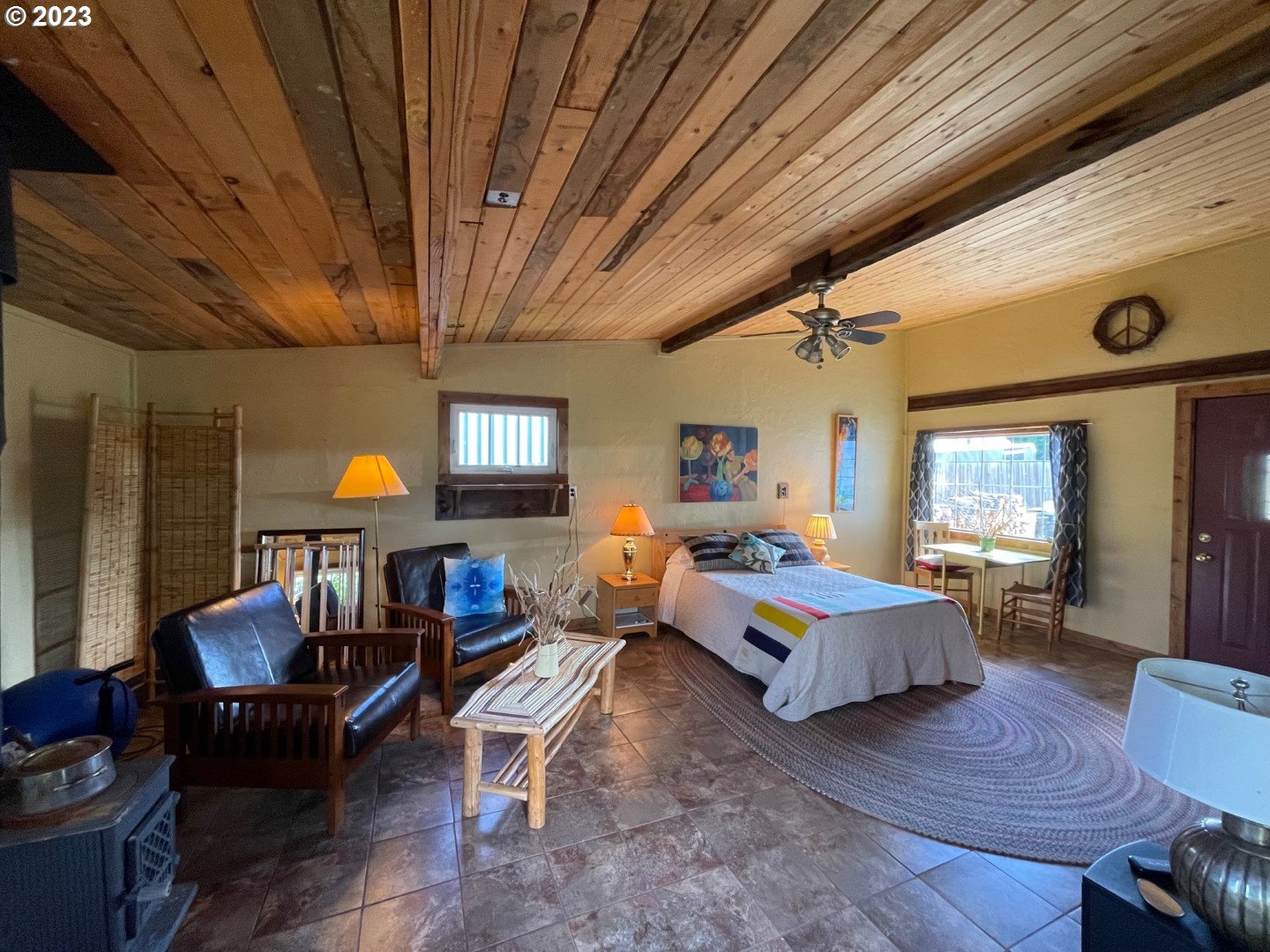 809 South Lake Street Joseph, OR 97846 - Photo 22 of 38 a living room with furniture and a chandelier