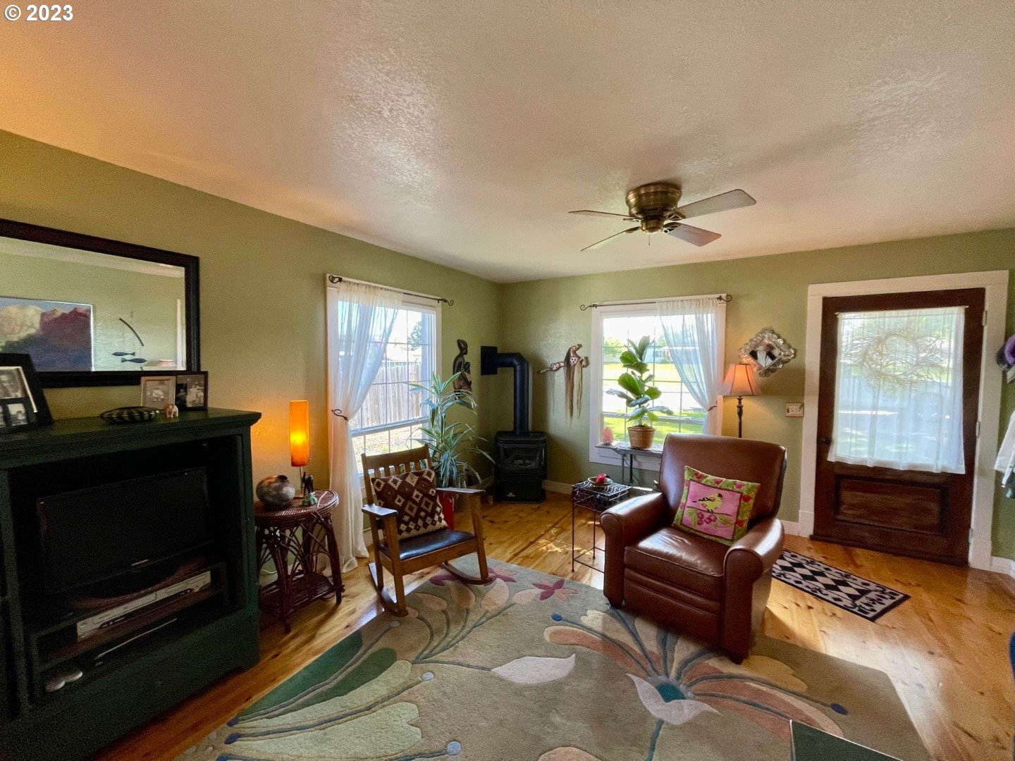 809 South Lake Street Joseph, OR 97846 - Photo 5 of 38 a living room with furniture and a fireplace