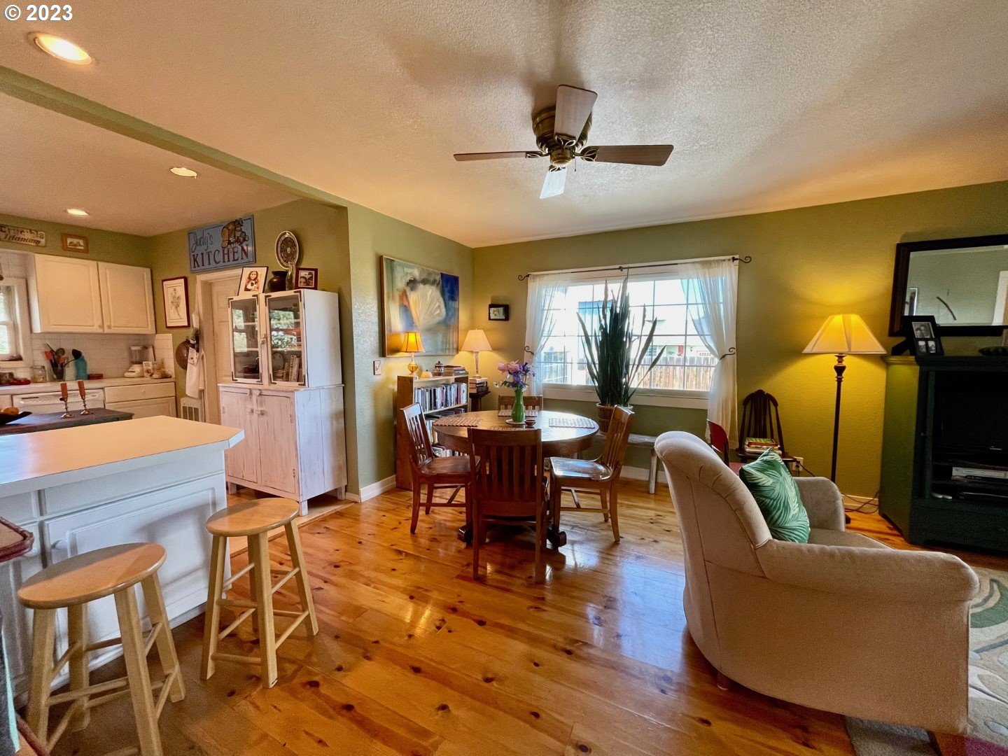 809 South Lake Street Joseph, OR 97846 - Photo 10 of 38 a living room with furniture and a chandelier