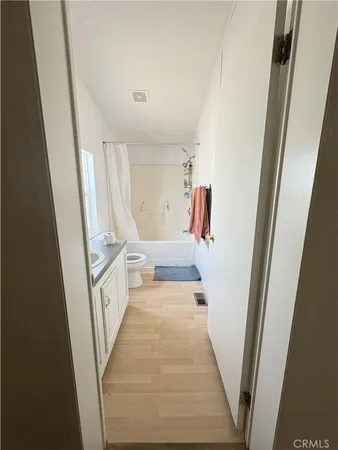 a view of a hallway view with staircase