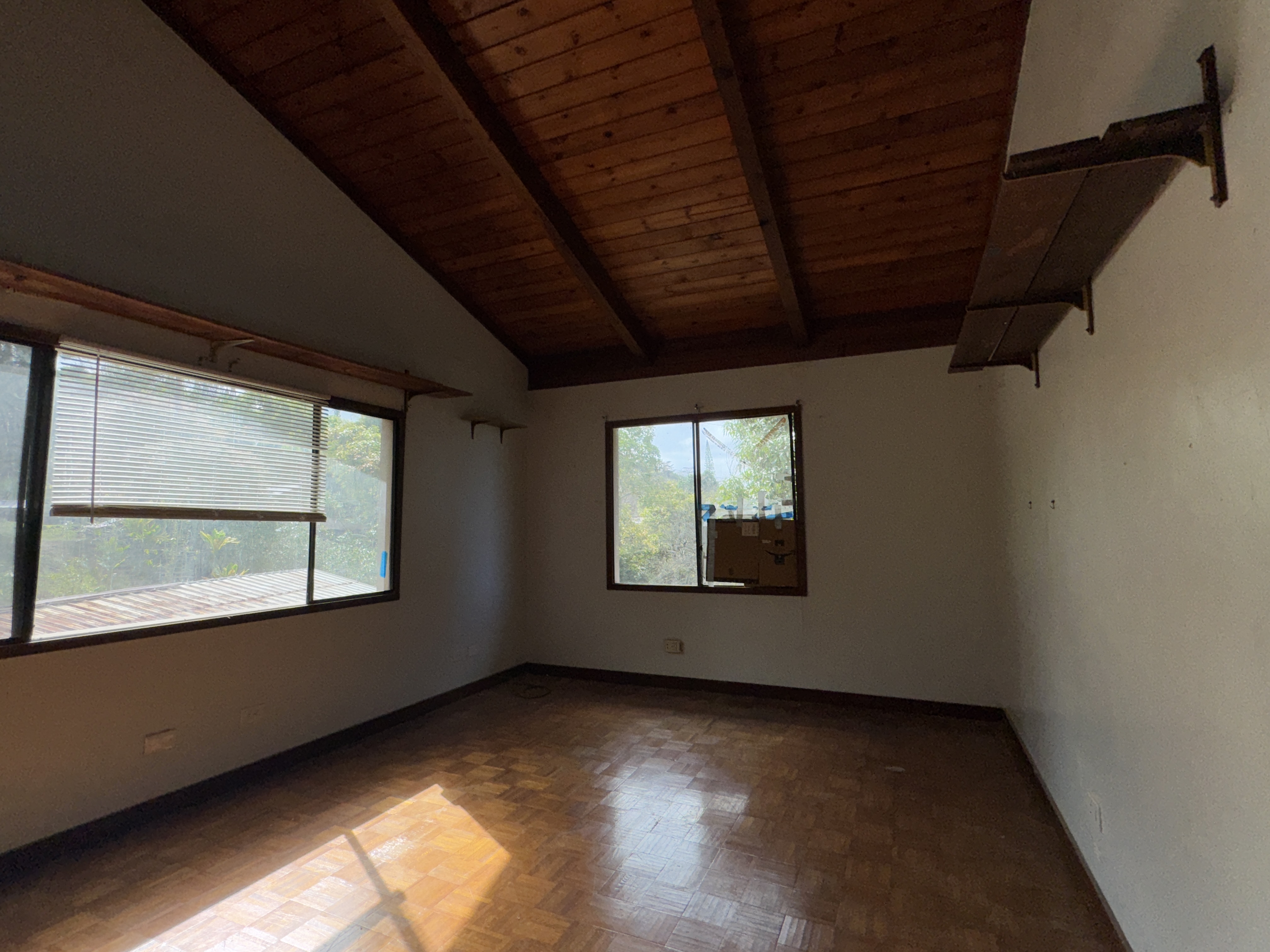 84-5040 Hawaiʻi Belt Road Captain Cook, HI 96704 - Photo 17 of 30 a view of empty room with windows