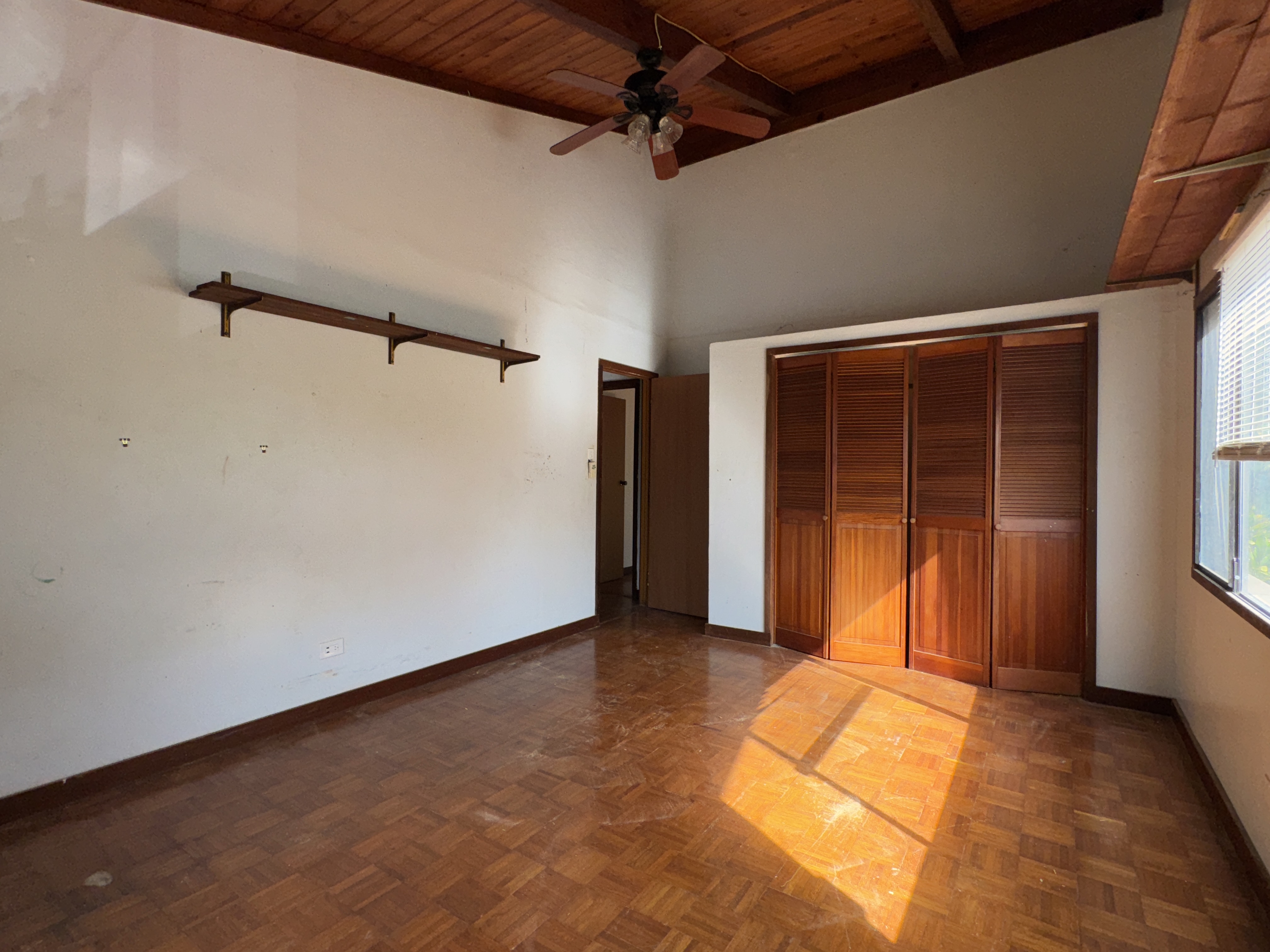84-5040 Hawaiʻi Belt Road Captain Cook, HI 96704 - Photo 18 of 30 a view of an empty room with a window