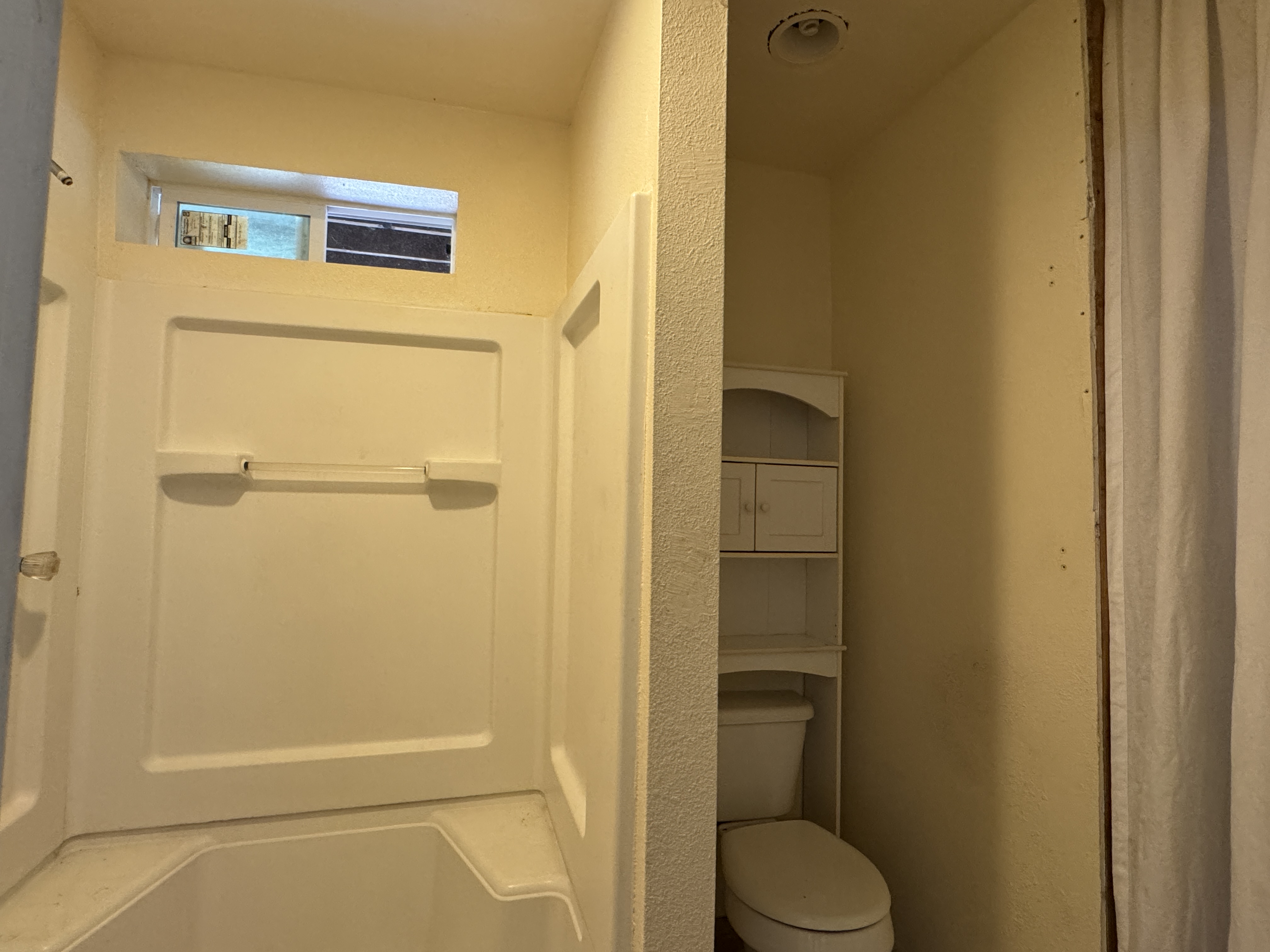 84-5040 Hawaiʻi Belt Road Captain Cook, HI 96704 - Photo 25 of 30 a bathroom with a toilet and a shower