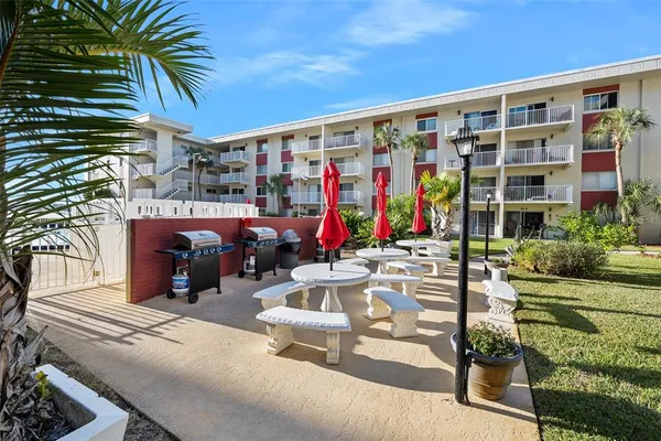 a view of yard with patio