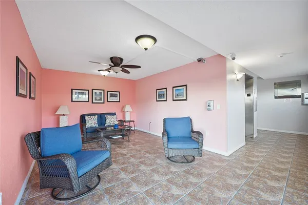 a view of a living room and dining room
