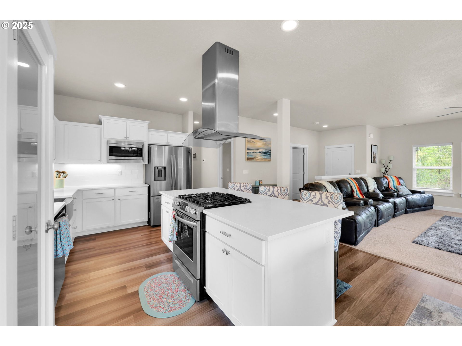 580 South 10th Street Monroe, OR 97456 - Photo 16 of 45 a kitchen with a stove a refrigerator and a sink