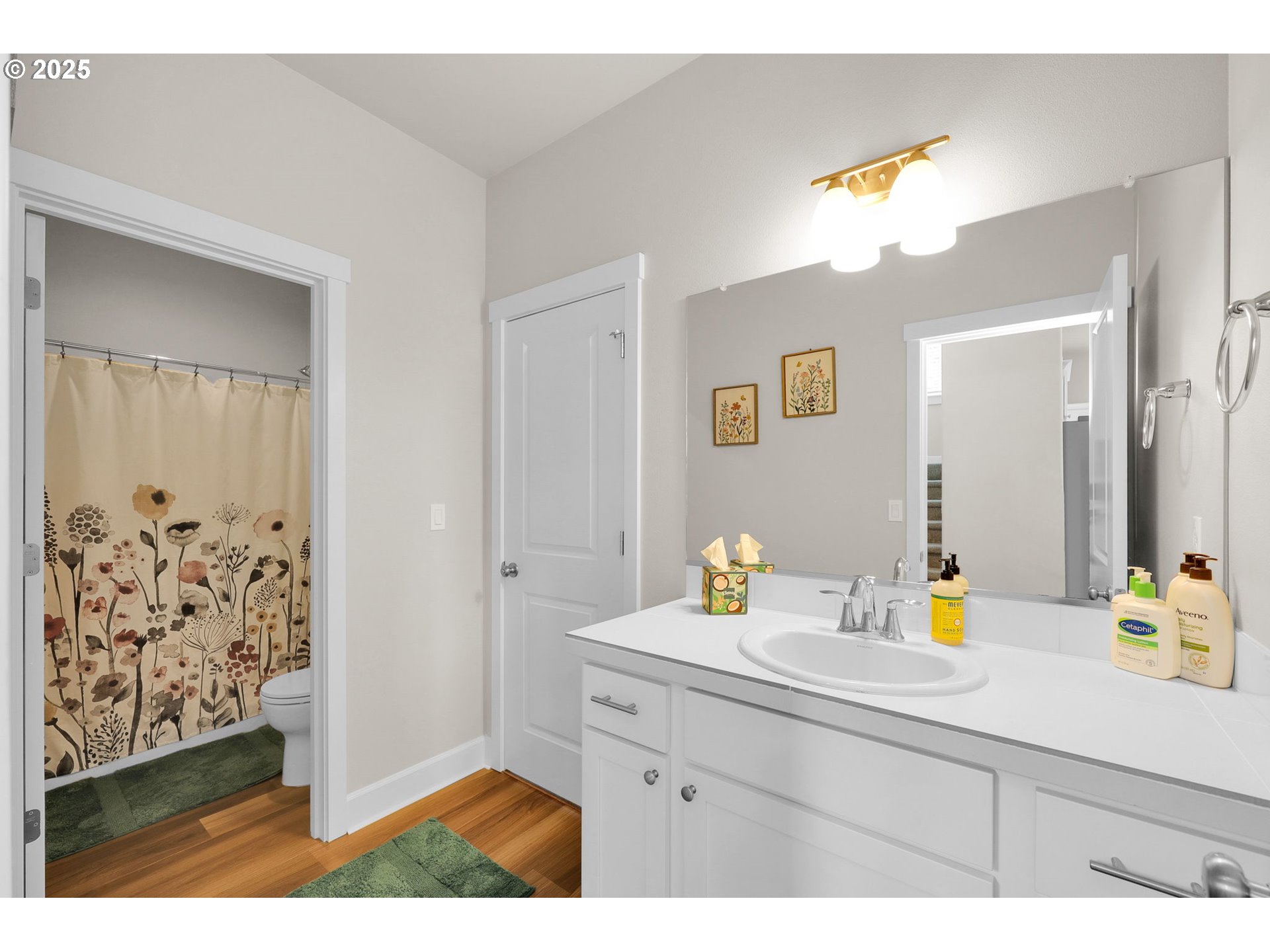 580 South 10th Street Monroe, OR 97456 - Photo 17 of 45 a bathroom with a sink mirror and vanity