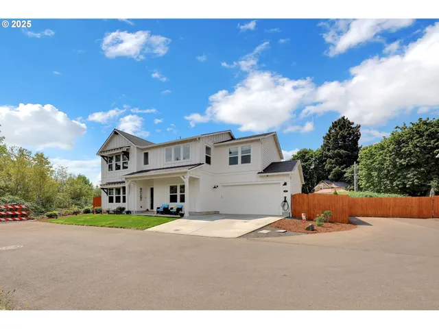 a view of large house with a big yard