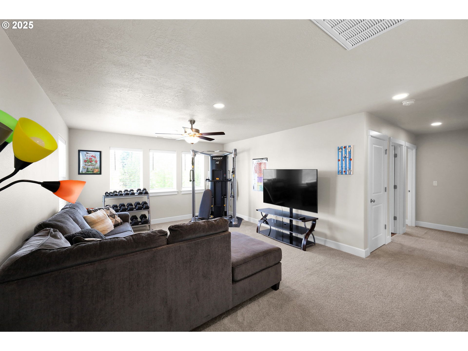 580 South 10th Street Monroe, OR 97456 - Photo 23 of 45 a living room with furniture and a flat screen tv