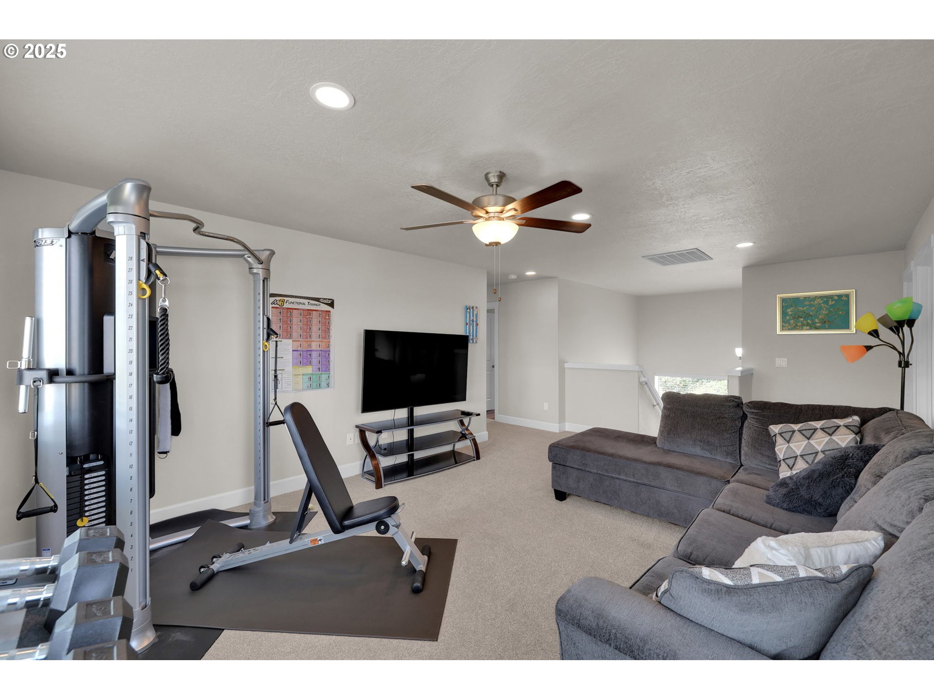580 South 10th Street Monroe, OR 97456 - Photo 24 of 45 a living room with furniture and a flat screen tv