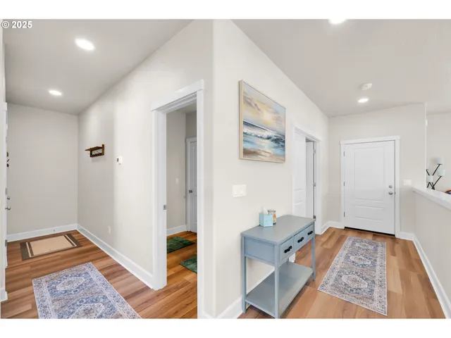 a living room with a rug