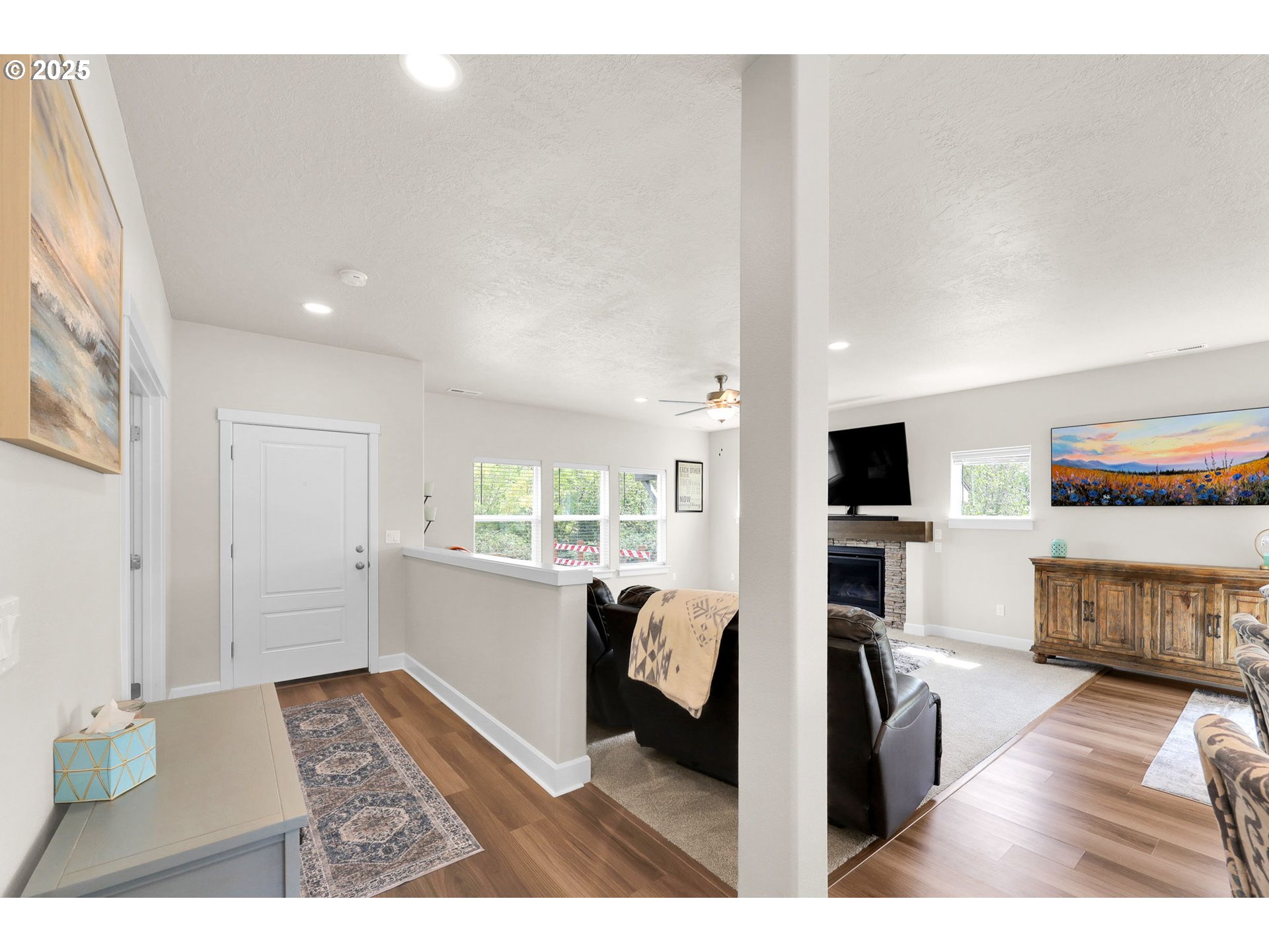 580 South 10th Street Monroe, OR 97456 - Photo 8 of 45 a view of living room filled with furniture and flat screen tv