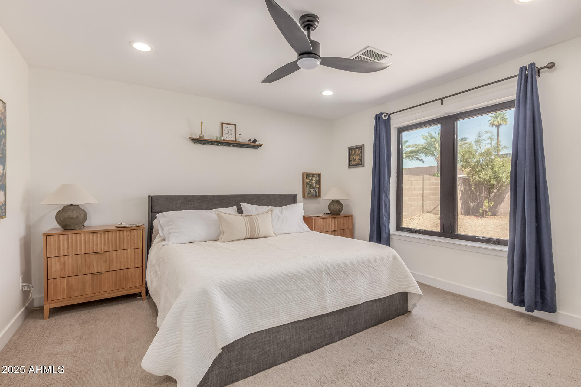226 East McKinley Street Tempe, AZ 85288 - Photo 13 of 36 a bedroom with a bed and a large window