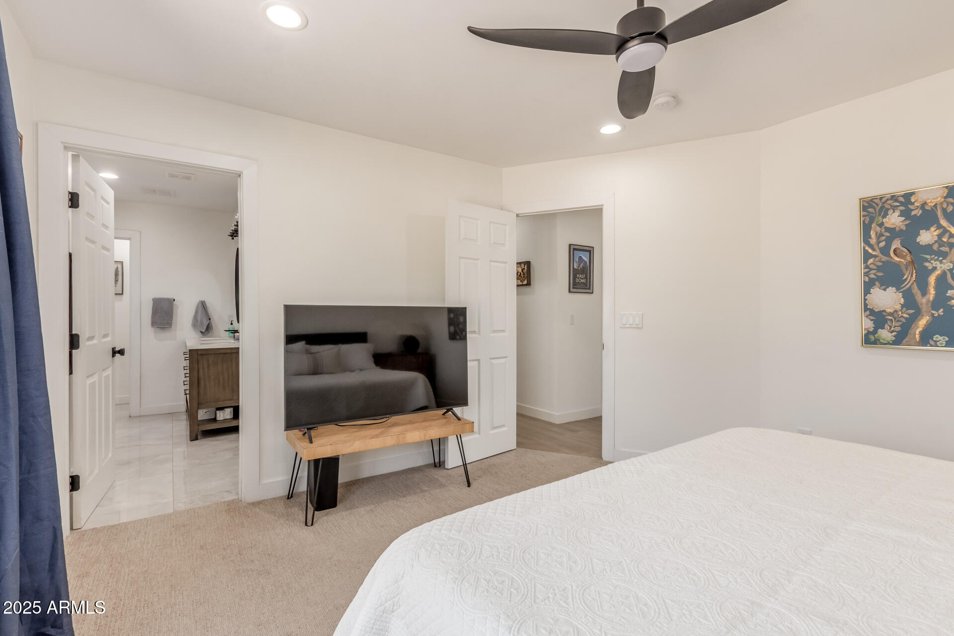 226 East McKinley Street Tempe, AZ 85288 - Photo 14 of 36 a bedroom with a bed and a chair