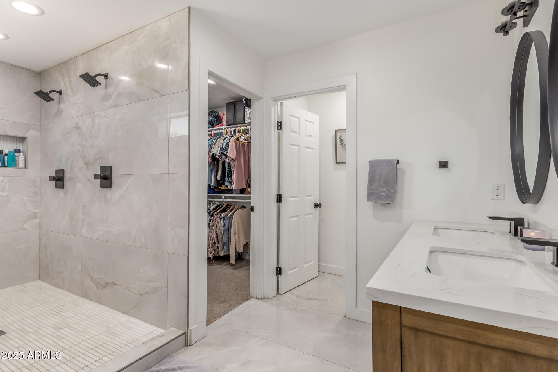 226 East McKinley Street Tempe, AZ 85288 - Photo 15 of 36 a bathroom with a sink and a shower