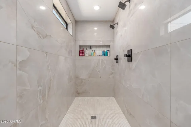 a bathroom with a sink and a shower