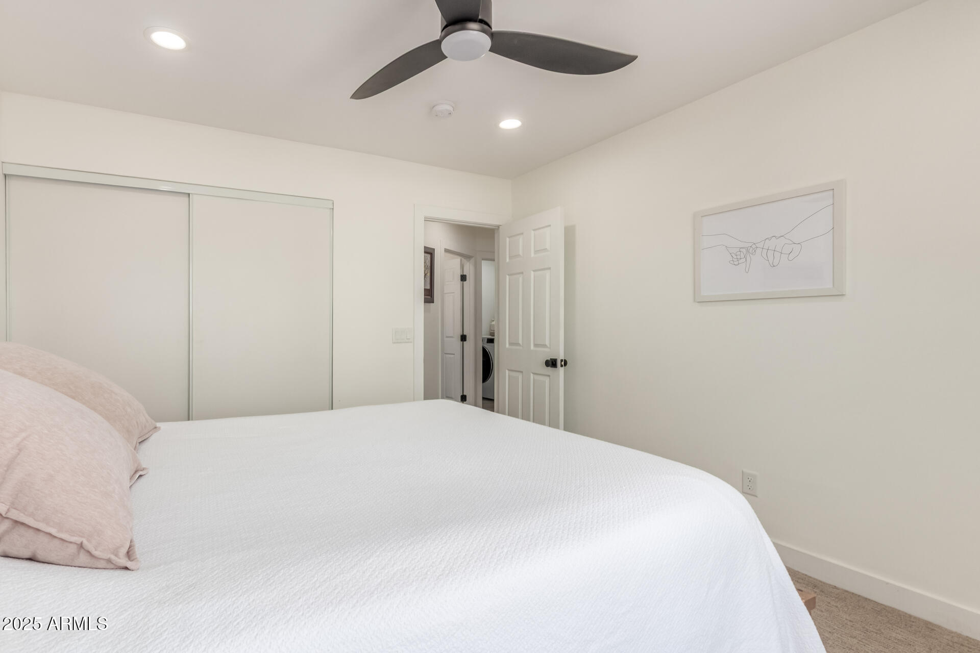 226 East McKinley Street Tempe, AZ 85288 - Photo 19 of 36 a large bed in a white room