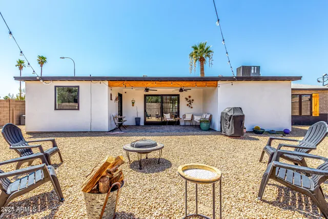 a view of a backyard with a patio