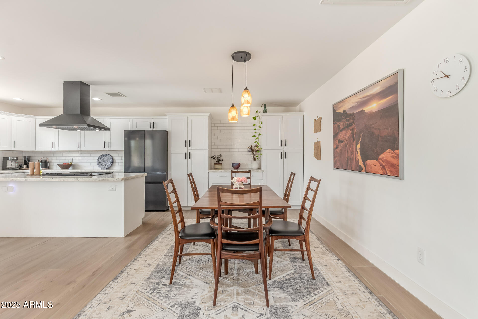 226 East McKinley Street Tempe, AZ 85288 - Photo 7 of 36 a view of a dining room with furniture and chandelier