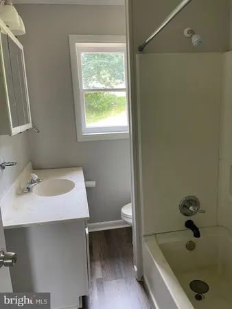a bathroom with a sink and a tub