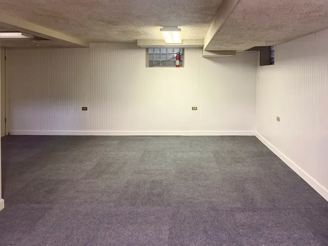 a view of a refrigerator in a room