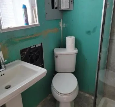 a bathroom with a sink and a toilet