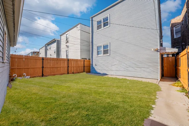 a view of backyard of house