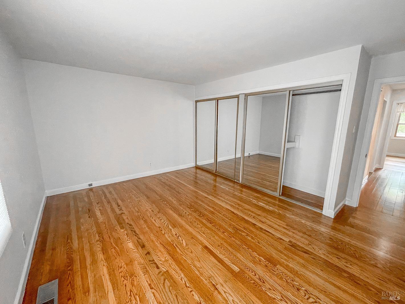 112 Reed Boulevard Mill Valley, CA 94941 - Photo 12 of 39 a view of empty room with wooden floor