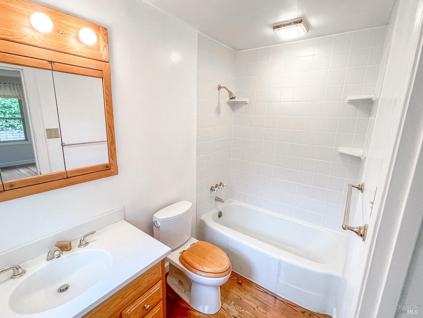 112 Reed Boulevard Mill Valley, CA 94941 - Photo 31 of 39 a bathroom with a sink a toilet and a bathtub