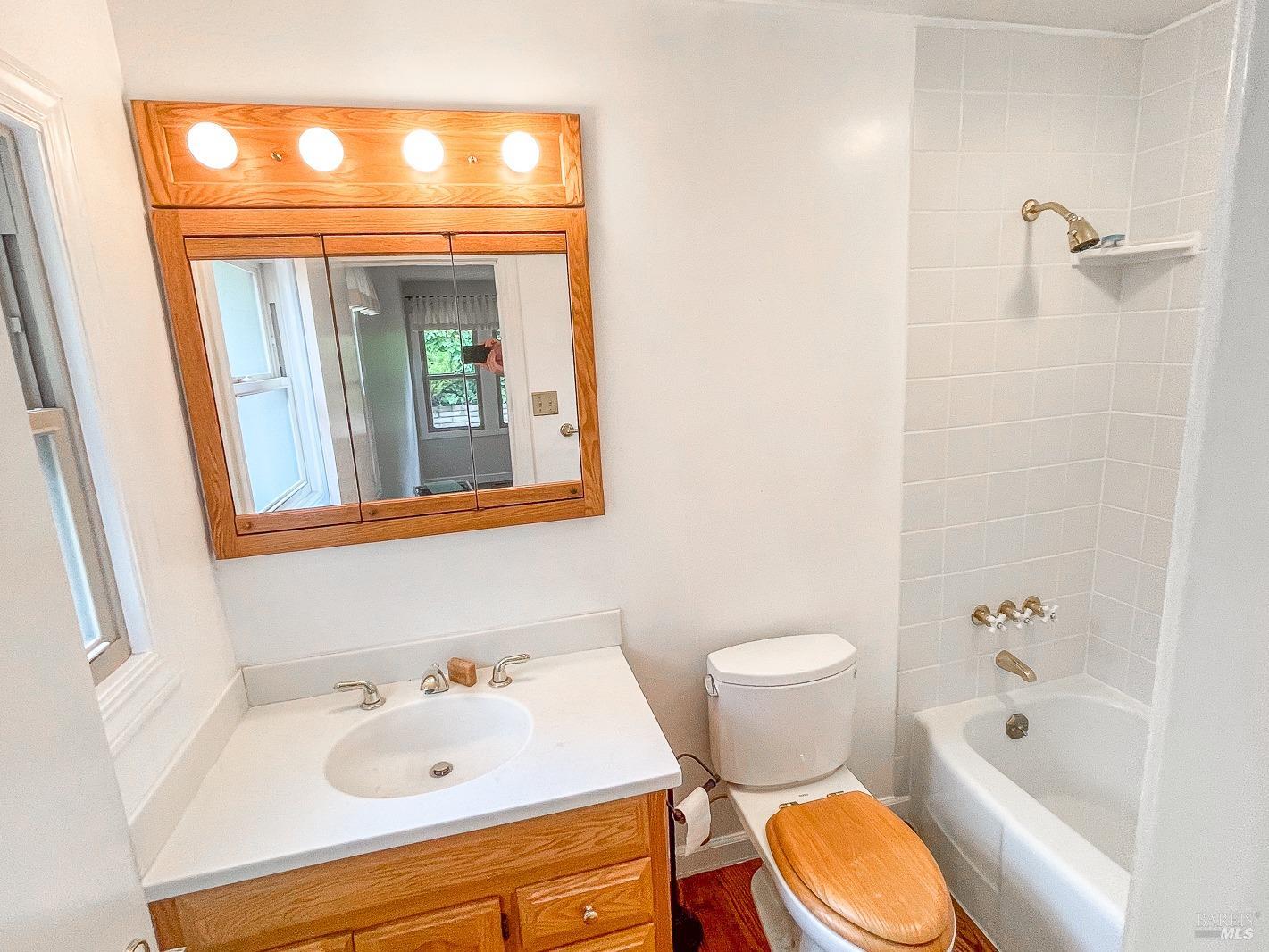 112 Reed Boulevard Mill Valley, CA 94941 - Photo 32 of 39 a bathroom with a sink a toilet and shower