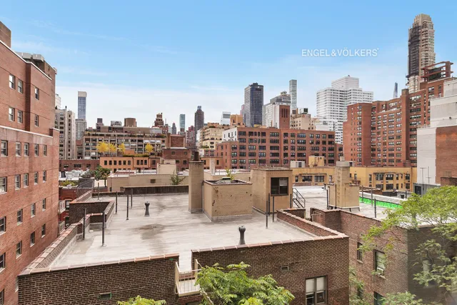 a view of a city with tall buildings