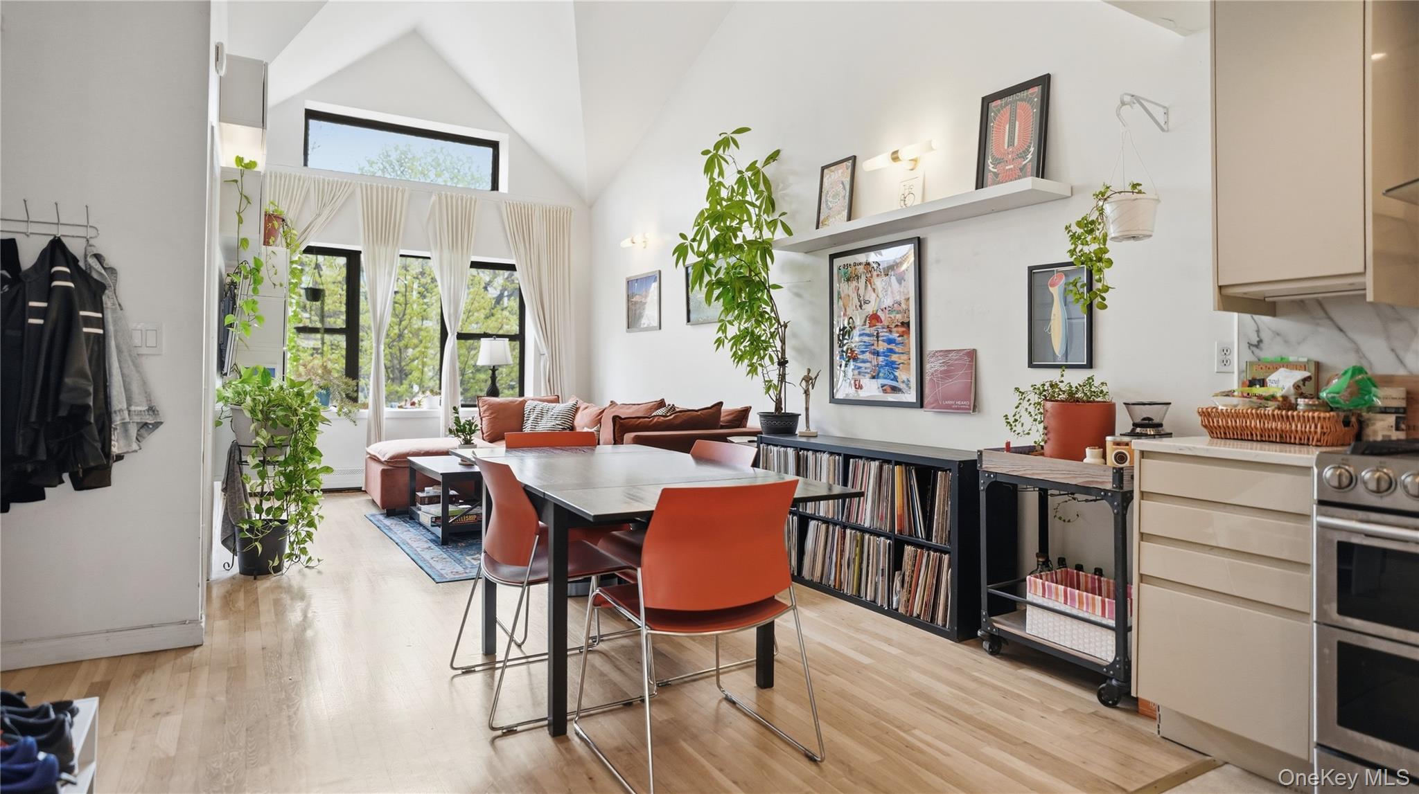 253 Cornelia Street Brooklyn, NY 11221 - Photo 12 of 36 a view of a dining room with furniture and wooden floor