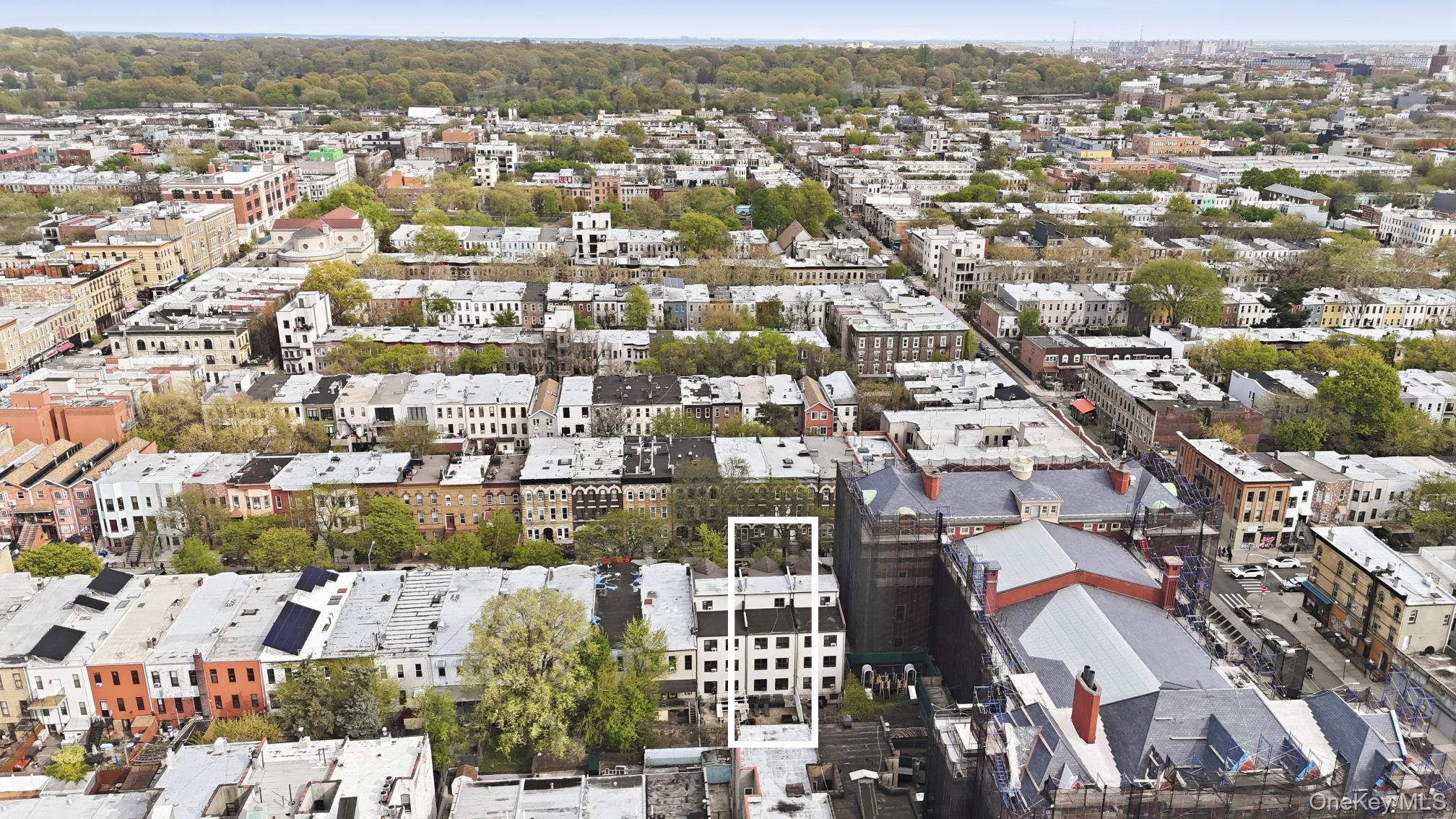 253 Cornelia Street Brooklyn, NY 11221 - Photo 2 of 36 an aerial view of residential houses with city view