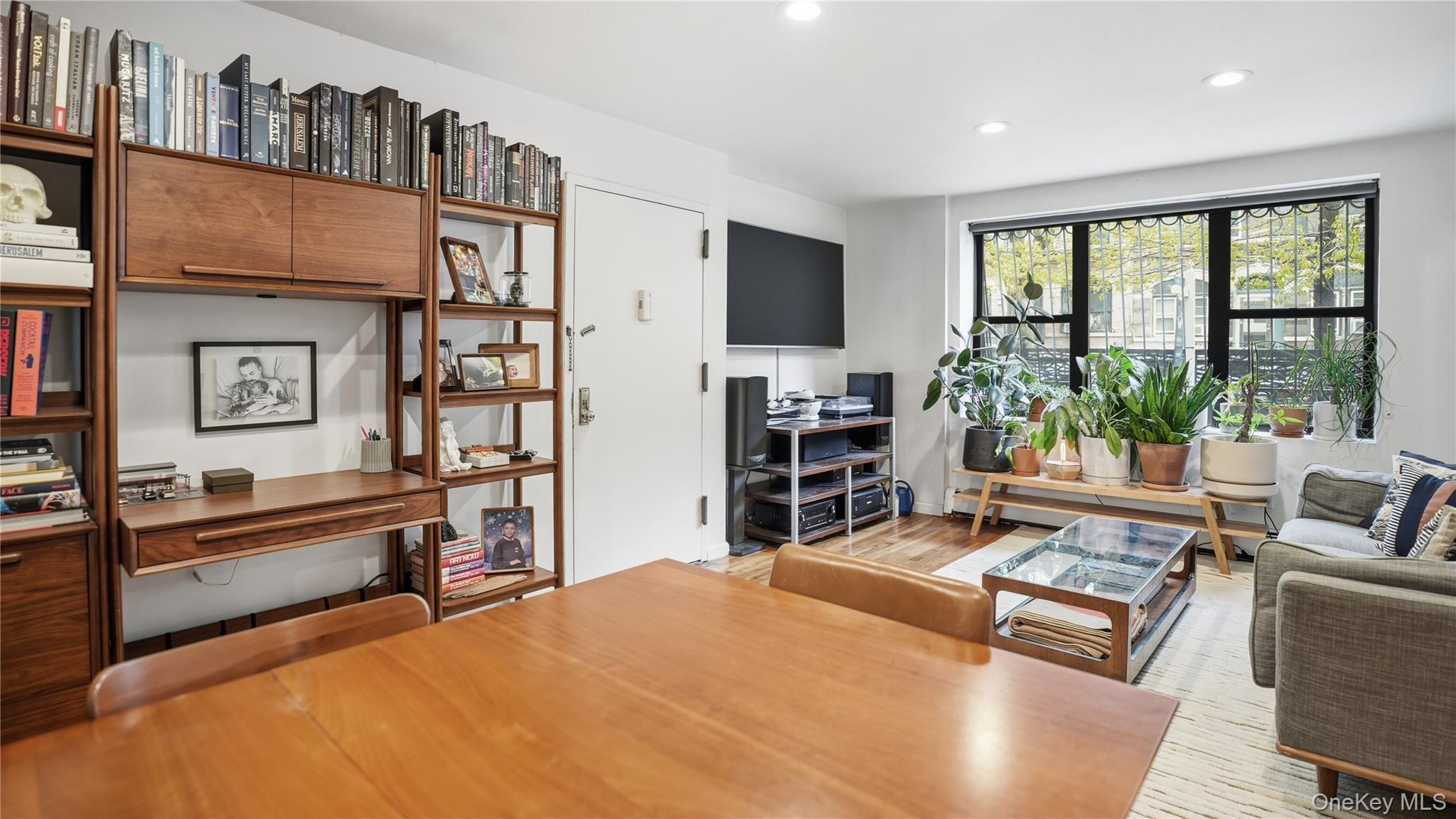 253 Cornelia Street Brooklyn, NY 11221 - Photo 22 of 36 a bedroom with furniture and a window