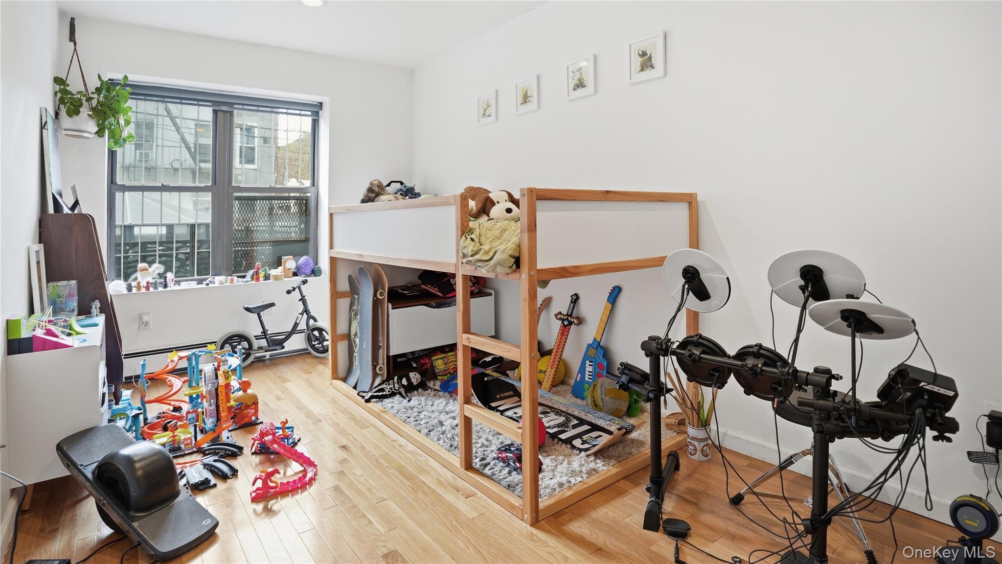 253 Cornelia Street Brooklyn, NY 11221 - Photo 27 of 36 a view of a room with gym equipment