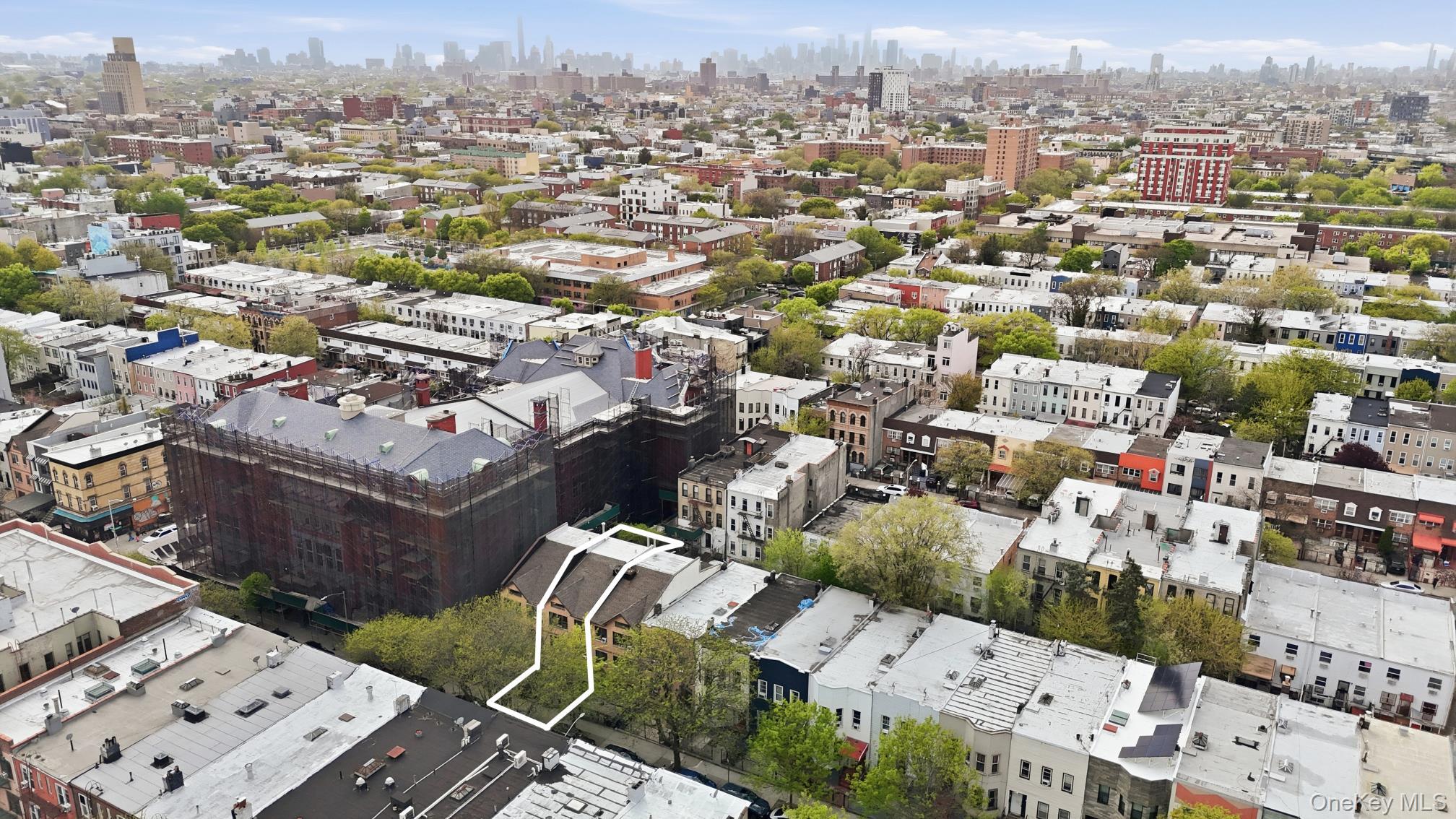 253 Cornelia Street Brooklyn, NY 11221 - Photo 35 of 36 an aerial view of a city with lots of residential buildings