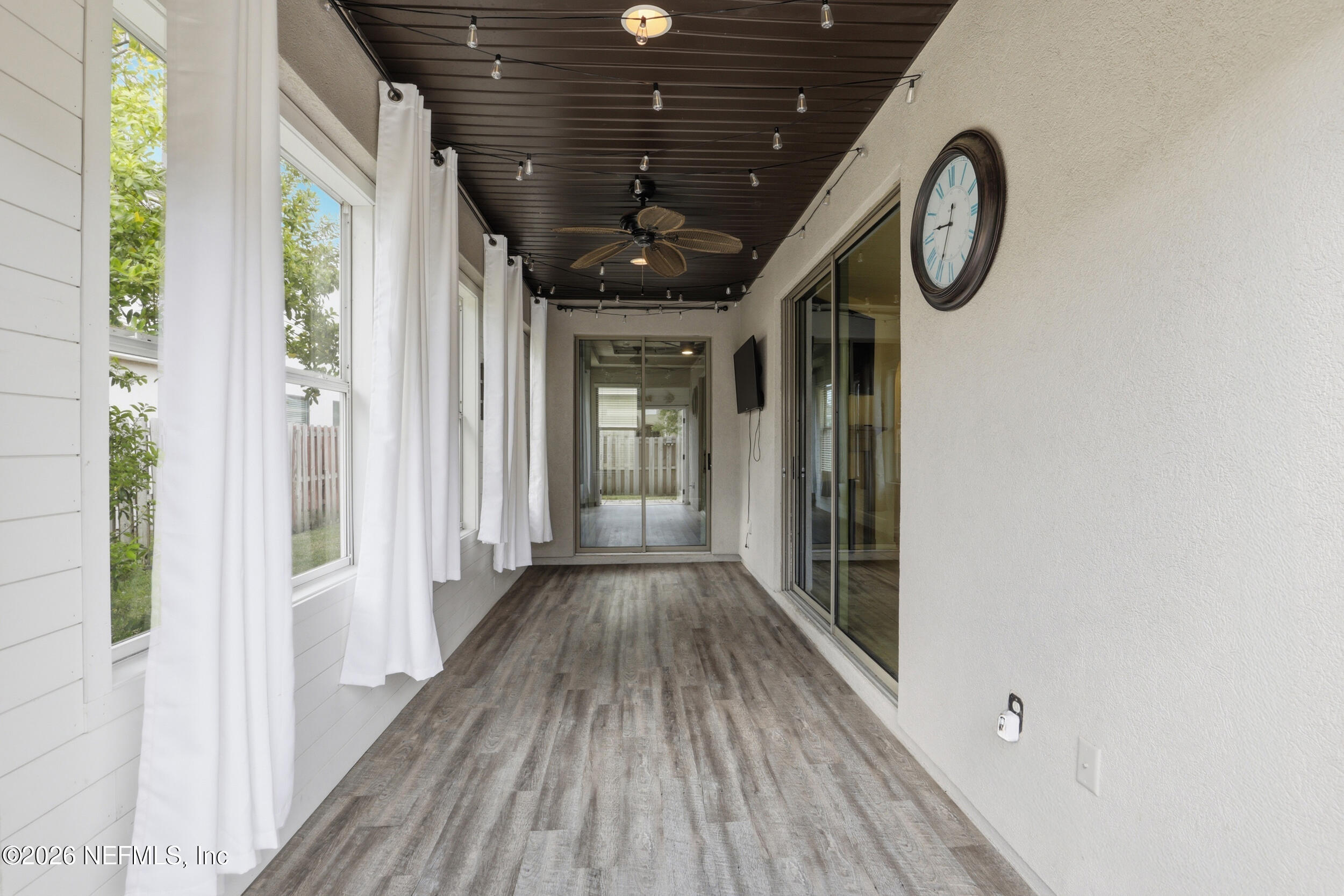 219 Straw Pond Way St. Augustine, FL 32092 - Photo 28 of 36 a view of a hallway with wooden floor