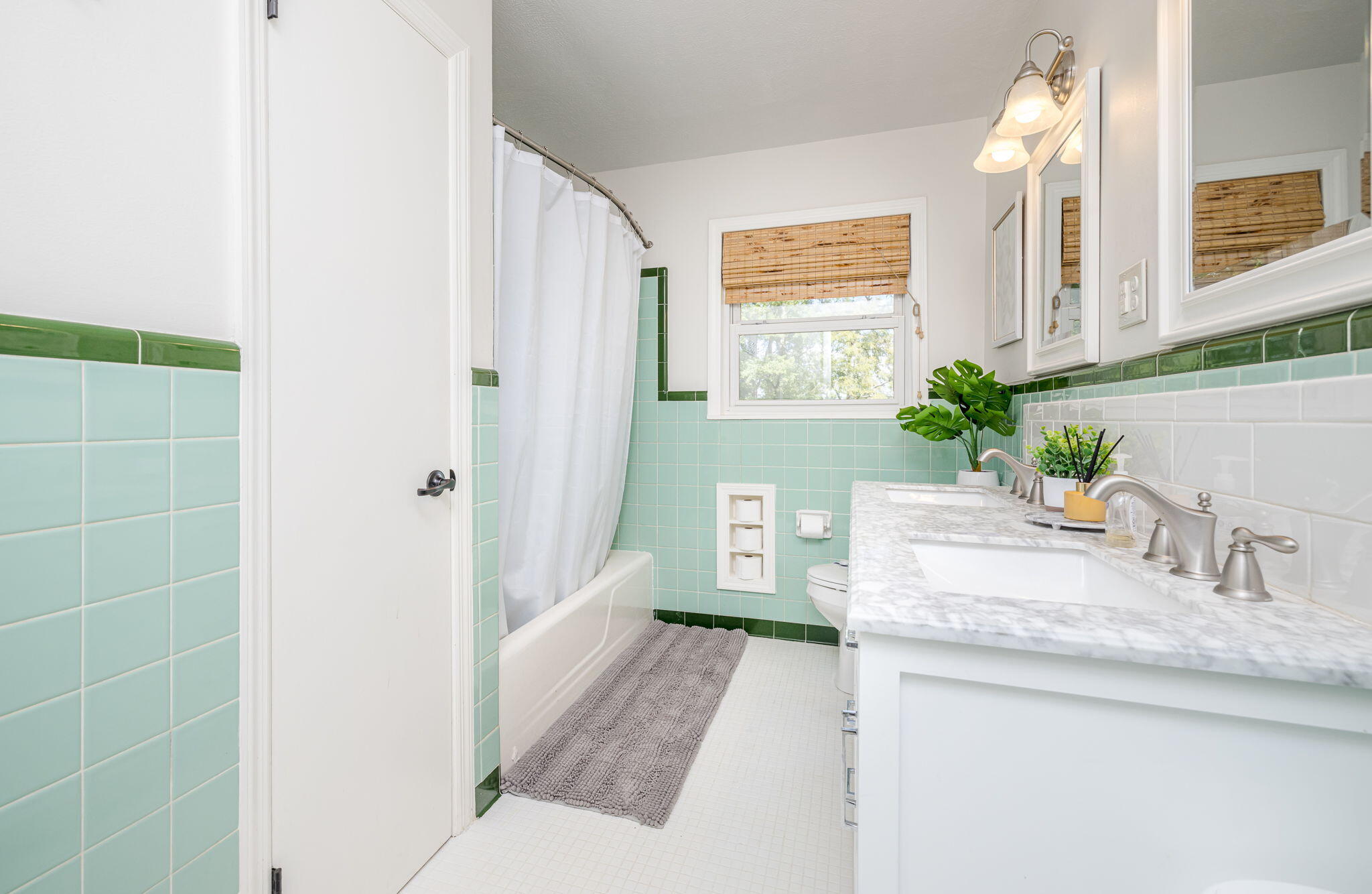 238 Meeting Street Road Edgefield, SC 29824 - Photo 23 of 65 Large Main bathroom with double sinks, closet space, and full shower tub combo.