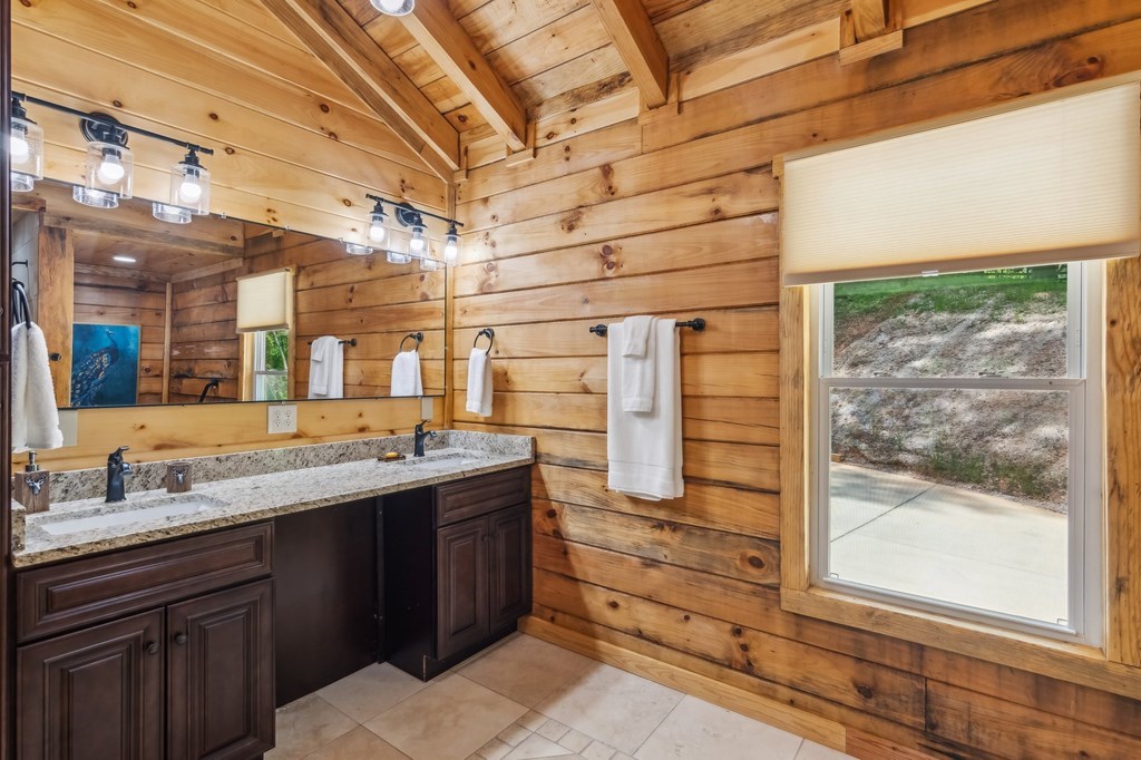 245 Timberwalk Drive Ellijay, GA 30540 - Photo 26 of 56 a kitchen with a sink and large window