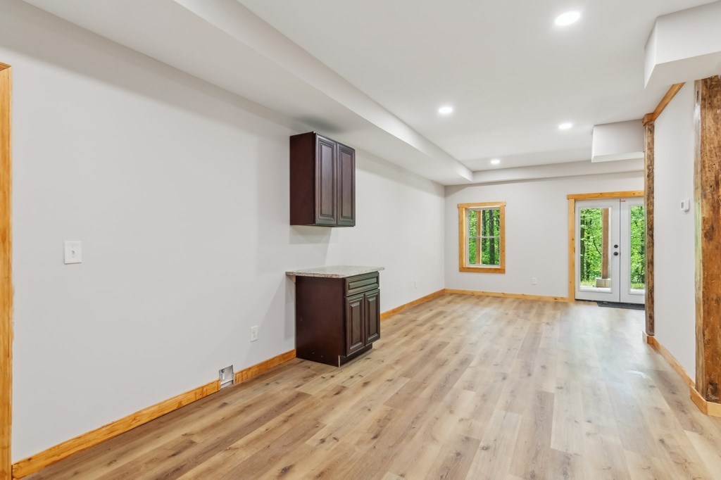 245 Timberwalk Drive Ellijay, GA 30540 - Photo 31 of 56 a view of empty room with wooden floor and fan