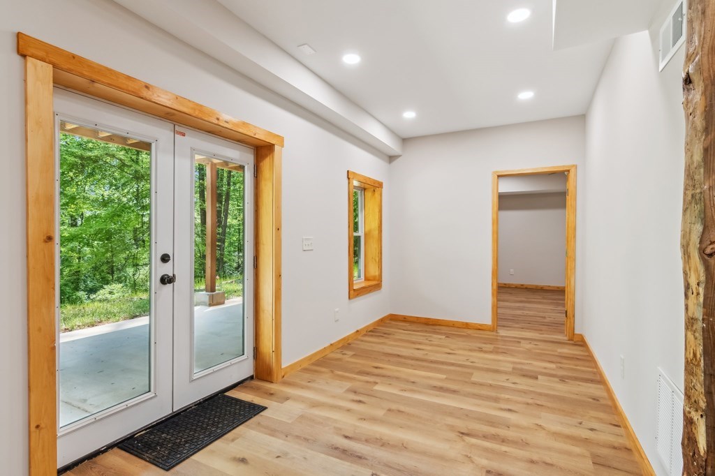 245 Timberwalk Drive Ellijay, GA 30540 - Photo 33 of 56 a view of a hallway with wooden floor and windows