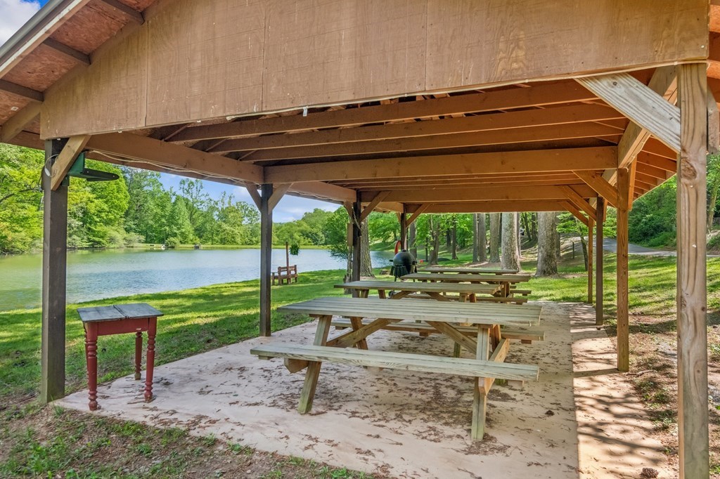 245 Timberwalk Drive Ellijay, GA 30540 - Photo 45 of 56 a view of a backyard with sitting area and furniture