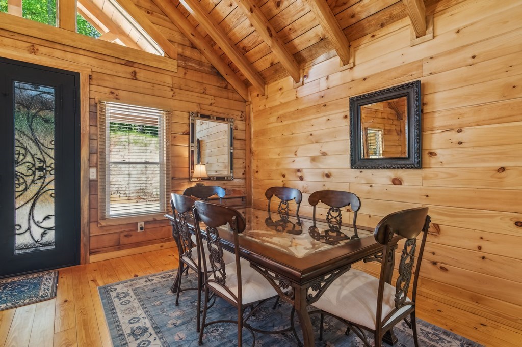 245 Timberwalk Drive Ellijay, GA 30540 - Photo 9 of 56 a view of a dining room with furniture window and outside view