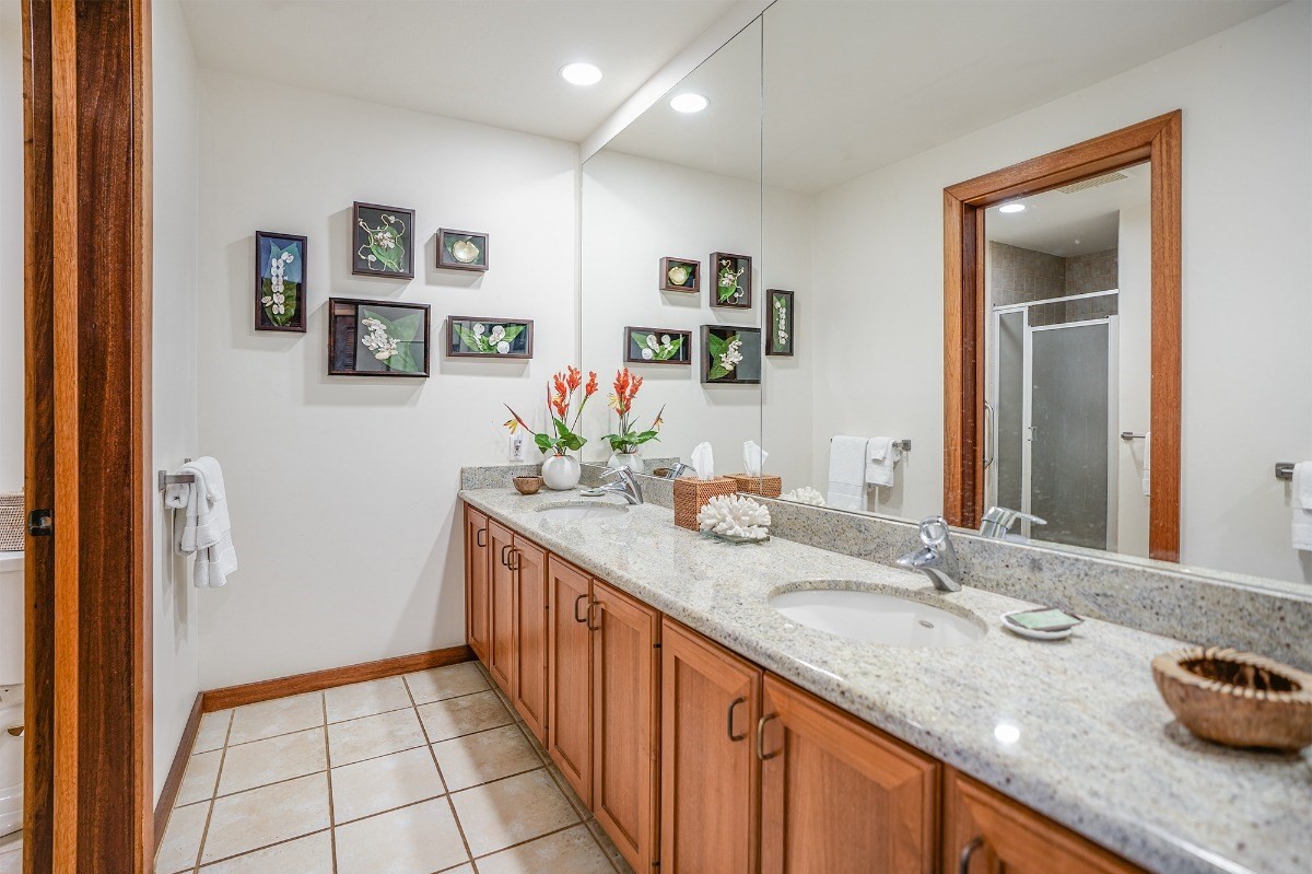 2221 Kapili Road, Unit 58 Koloa, HI 96756 - Photo 14 of 30 a bathroom with sink and mirror
