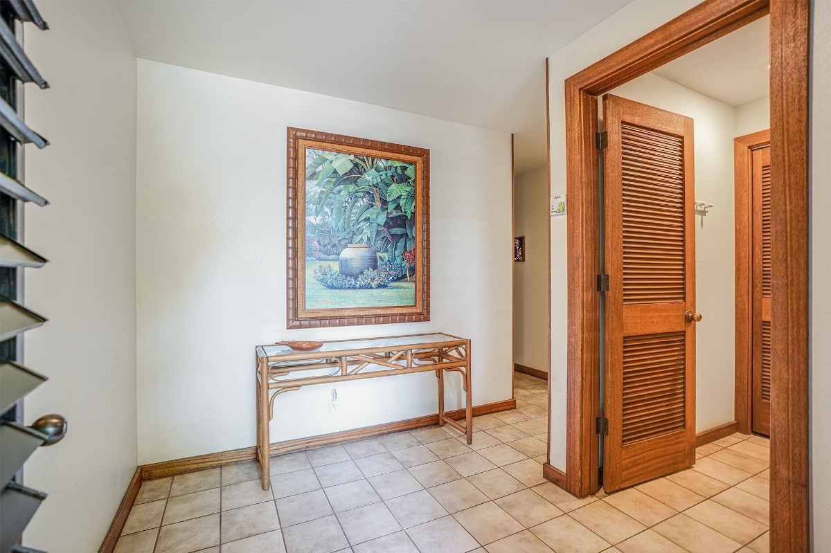 2221 Kapili Road, Unit 58 Koloa, HI 96756 - Photo 22 of 30 a view of a livingroom with furniture and a hallway