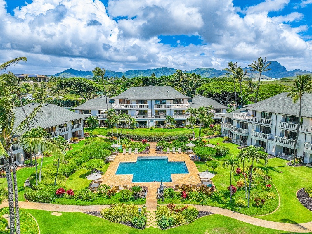 2221 Kapili Road, Unit 58 Koloa, HI 96756 - Photo 25 of 30 a view of a big yard with plants and large trees