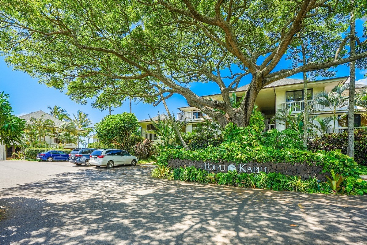 2221 Kapili Road, Unit 58 Koloa, HI 96756 - Photo 30 of 30 a cars parked on the side of a street